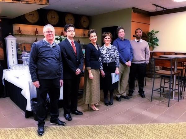 (From l-r) Mark Webb of CoreSys Federal, Julian Mendoza, French Henry, Dowell, Roda, and Massey pause for a  photo at the March event.