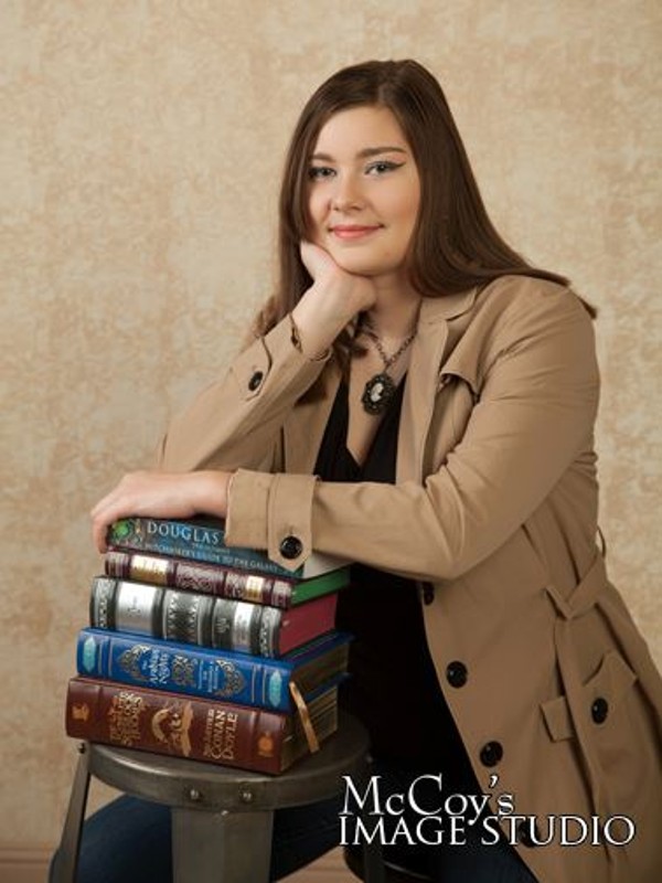 Rebecca Isaacs, a graduate of Faith Homeschool Group, was awarded a $1,000 scholarship at the chapter's September general membership meeting.