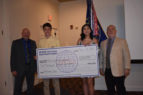 Gavin Vice (middle left) and Langley Williams (middle right) accept a Lift Off Scholarship Award from Martin Harbolt, chairman, board of directors (far left), and Michael Tague, chapter president, at the June event.