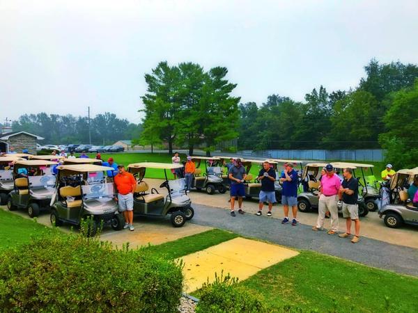 The chapter's Annual Scholarship Fundraiser Golf Scramble participants prepare to ride to their starting positions at the September event.