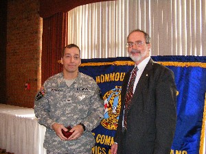 Chuck Strimpler (r), chapter president, presents a chapter memento to Col. Scot MacKenzie, USA, director for strategic planning, U.S. Army Communications-Electronics Command (CECOM) Life Cycle Management Command, in appreciation for his discussion at the November meeting.