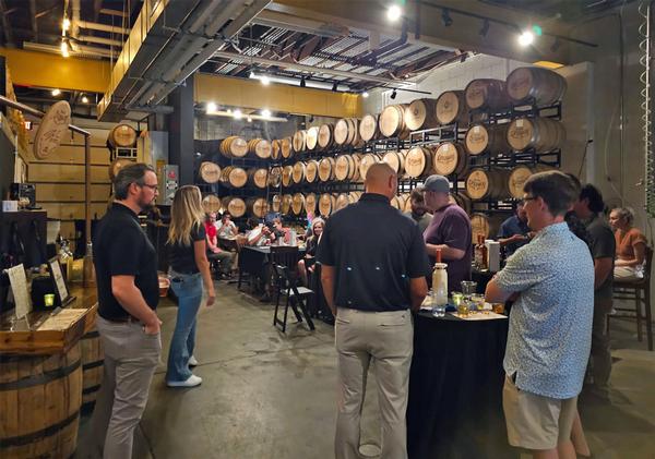 In September, the chapter engages in its first Cyber Pairing event held at the Brickway Brewery and Distillery in the Old Market, Omaha, Nebraska. The activity was an AI Thought Leadership gathering, inspiring networking with Omaha Cyber and IT Leaders. Meshed into the proceedings was a guided tour of a curated lineup of libations and select food items. Allison Judge, the event project manager who organized the activity on behalf of the chapter, can be seen sharing a quick word with the gathering of attendees. The event was a success and entirely sponsored by Cribl and Axonius.