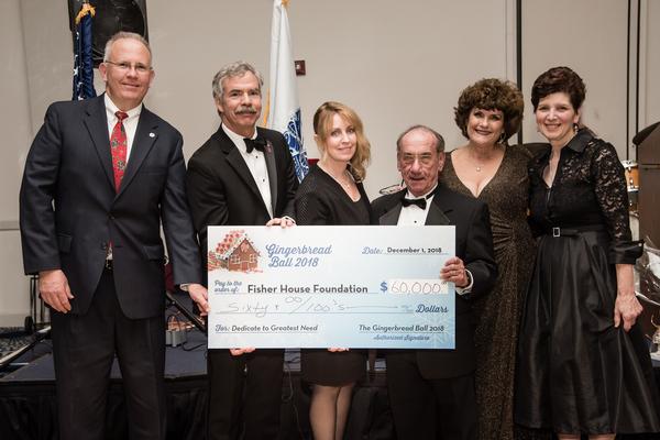 A $60,000 check is presented to Fisher House Foundation at the December 2018 Gingerbread Ball. Presenters are (l-r) Col. Myles Murphy, USAR (Ret.), AOC, Garden State Chapter president; Capt. Brian Gawne, USN (Ret.), Fisher House Foundation, vice president of community relations; Ms. Donna V. Petro, chapter president; Col. Samuel Fuoco, USA (Ret.), AUSA Monmouth president; Kit Roache, chapter vice president of programs and Gingerbread Ball committee chair; Ms. Margaret Tamburri, vice president of NJBBT.
