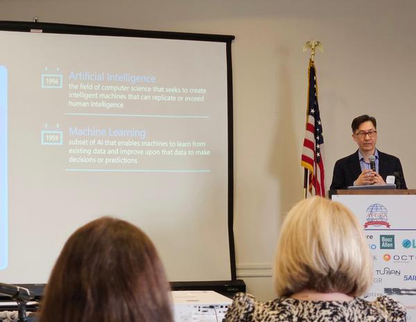 Dr. David Rhew, global chief medical officer at Microsoft, presents during the March luncheon.
