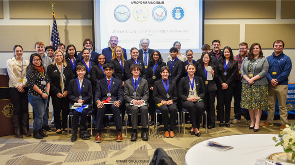 Members of the C5ISR Center, Naval Air Warfare Center, U.S. Air Force and AFCEA International, who served as judges for the New Jersey Southern Junior Science and Humanities Symposium, pose for a photo during the February event. 