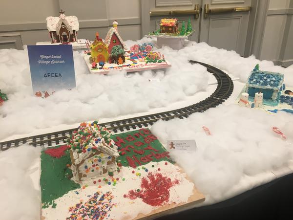 At the December Gingerbread Ball, the gingerbread house and Gingerbread Village Sponsor is on display.