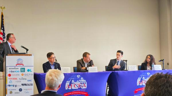 The panelists engaged in a lively discussion on the current applications of AI in health care and their projections for its future impact during the March luncheon.