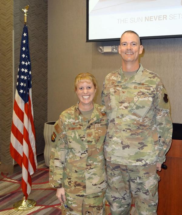 Col. Kristen Thompson, USAF (l), commander, 55th Wing, Offutt Air Force Base, Nebraska, poses with Col. Larry Fletcher, USAF, chapter president. Col Thompson was the speaker for the August luncheon and received a Greater Omaha Chapter coin for addressing the chapter.