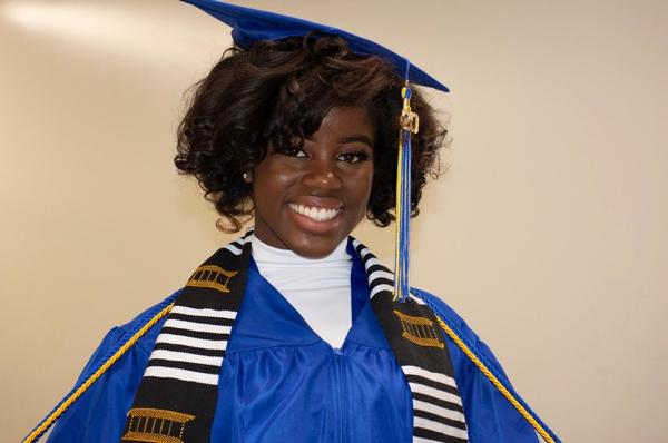 At the chapter event in August, Sha'lise Oliver is awarded a scholarship. She will attend North Carolina Agricultural and Technical State University to study civil engineering.
