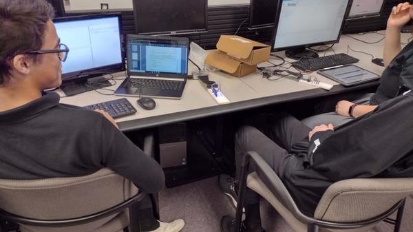 In May, students from FBS use integrated development environment equipment during their robotics class. 