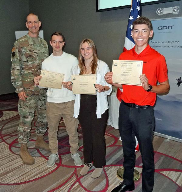 Col. Fletcher (l) stands with three of the chapter’s six scholarship recipients. (l-r) Christopher Finnigsmier, a senior graduating from Millard West High School, Omaha, Nebraska, will attend the University of Kansas, Lawrence, Kansas. Finnigsmier will pursue a degree in mechanical engineering. Marley Dodenhof, a senior graduating from Omaha Central High School, Omaha, Nebraska, will attend the University of Michigan, Ann Arbor, Michigan. Dodenhof will pursue a degree in aerospace and astronautical engineering. Ryan Acosta, a senior graduating from Bellevue West High School, Bellevue, Nebraska, will attend the University of Nebraska, Omaha. Acosta will pursue a degree in architectural engineering.