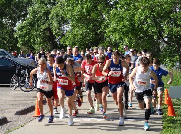 In May, participants blast off from the starting line during the Chapter's 6th Steps for STEM 5K held at Walnut Creek Park in Papillion, Nebraska.
