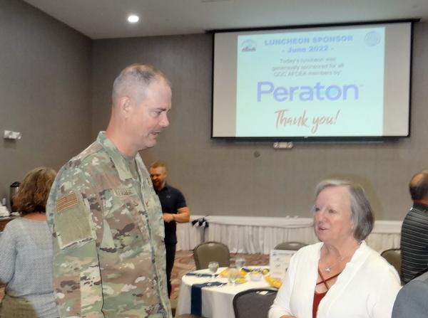Col. Fletcher stands with Gen. Napper at the June luncheon.