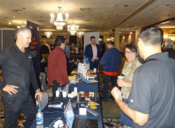 In October, attendees of the October exposition mingle and network.