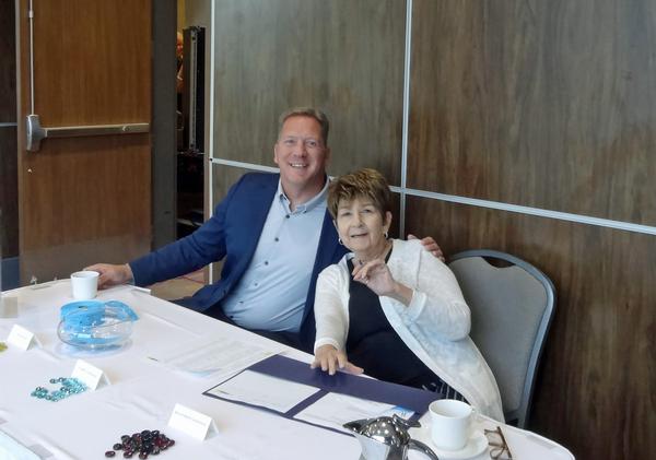 Eric Heitzenroder, operations manager, CACI, sits with Rosalie Sutherland, 55th Communications Group, commander's secretary, Offutt Air Force Base. Heitzenroder, a long-standing chapter supporter and member, helped Sutherland with the August luncheon check-in. Sutherland has been the chapter's luncheon administrator for more than 24 years. Thanks for the support, Rose!