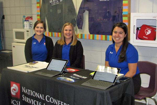 Three members of staff from National Conference Services Inc. (NCSI), Columbia, Maryland, pause for a photo. Pictured are (l-r) Devin Foss, project manager; Danielle Sanders, director of events; and Kristen Coker, event manager.