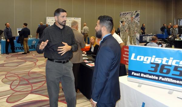 Attendees network at the October Technology Expo.