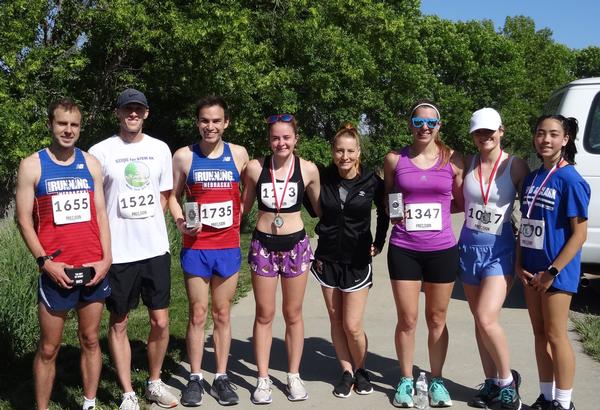 Finalists in the 7th Steps for STEM 5K held in May are (l-r) Colin Morrisey, Men's 2nd Place; Riley Martin, Men's 3rd Place; Andy Vasquez, Men's 1st Place; Allie Czapla; Nelson; Kristen Griffin, Women's 1st Place; Madelyn Anderson, Women's 2nd Place; and June Yamamoto, Women's 3rd Place. Czapla was the actual Women's 2nd place finisher but did not accept the award due to her age and continued participation in high school track. 