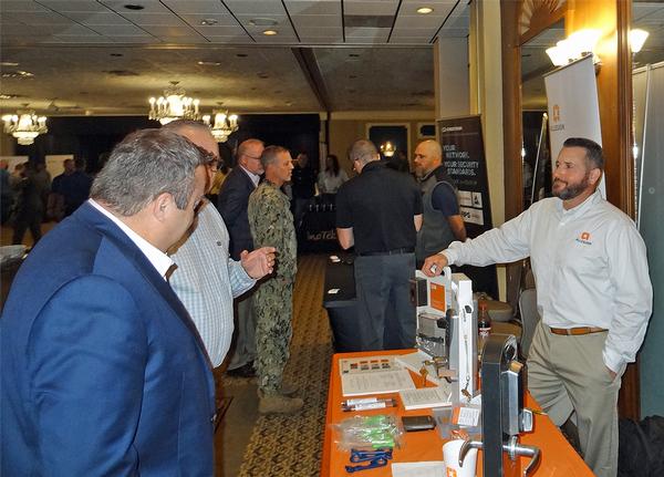 Participants in the October exposition at the Warhawk Community Center in Bellevue, Nebraska, explore some of the 43 companies in attendance.