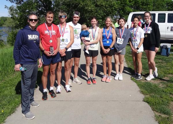 Finalists in the chapter's 8th Steps for STEM 5K held in May are pictured: (l-r) Merkle; Colin Morrissey, Men 1st Place; Xavier Mallow, Men 2nd Place; Maxx Seminario, Men 3rd Place; Katie Fitzsimmons, Women 1st Place; Robin Higley, Women 2nd Place; Lily Zhang, Women 3rd Place; June Yamamoto, Women original 2nd place finisher but turned down her prize to retain high school eligibility; and Ruth Greska, Women original 3rd place finisher but turned down her prize to retain high school eligibility.