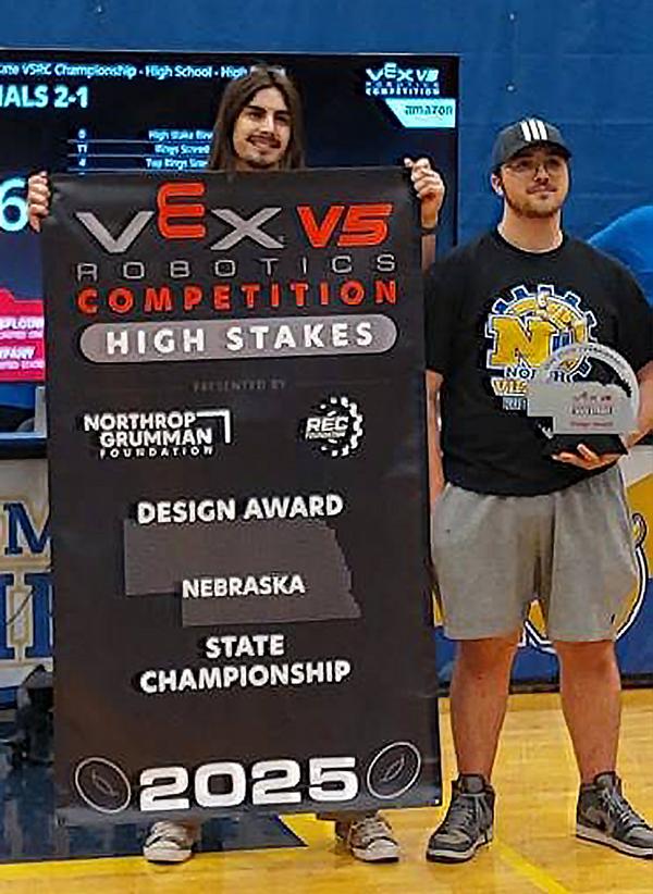 Bower and Langan pose for a winning photo at the March event.