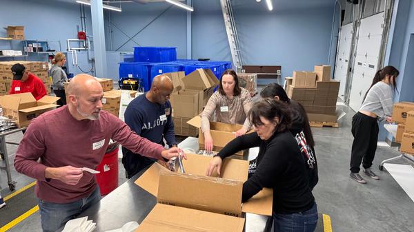 Volunteers support the chapter's first Food Bank of the Heartlands work day in February. The chapter will definitely participate in this feel-good effort again.