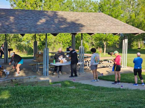Participants check in for the chapter's 8th Steps for STEM 5K at Walnut Creek Lake in May.

