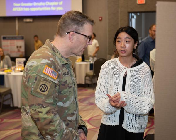 Mandy Lao discusses her science project with Eubank in March.