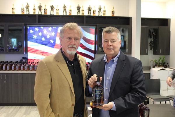 Chapter's First Vice President Brandt Cosgrove poses with Norm Hooten at the April event.