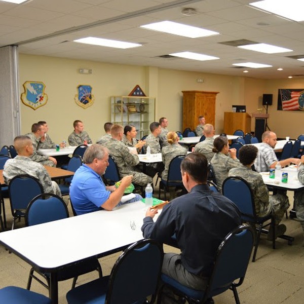 In October, meeting attendees listen as guest speaker Chris Waltman discusses his former IT position at Biloxi's casino and how it relates to security practices in the Department of Defense.