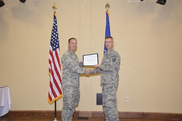 Chapter President Master Sgt. David Way, USAF, presents guest speaker Lt. Col Michael P. Zink, USAF, a letter of appreciation in November.