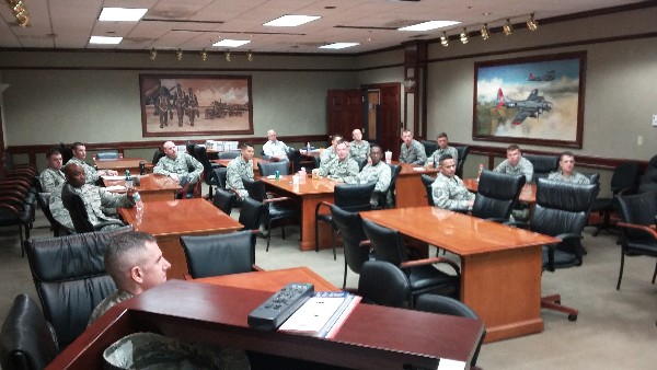 Members of the chapter prepare for guest speaker Lt. Col. Nathaniel Huston, USAF, 333 Training Squad, to take the podium at the luncheon in March. 