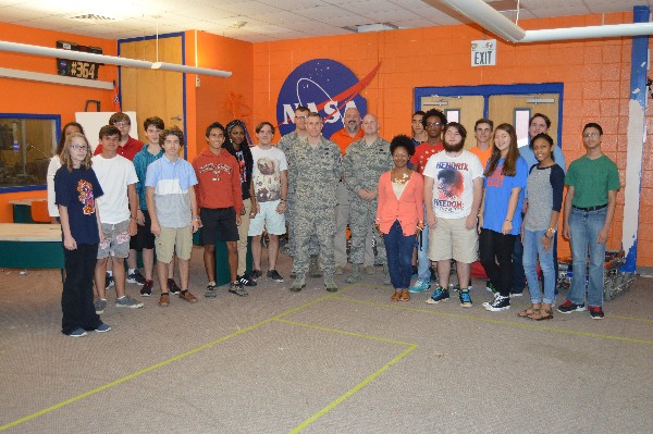 Gulfport High School engineering and robotics students mingle with chapter representatives at the event in August. 