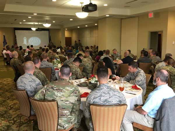 Attendees at the October event listen as Blackwell discusses the importance of Kessler Air Force Base's role in ensuring the cyber force is properly trained.