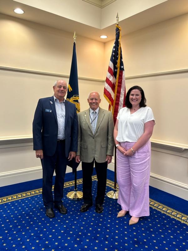 (l-r) Palmer Sims, regional vice president; Hiser, past chapter president; and Johnson pause for a photo during the July event.