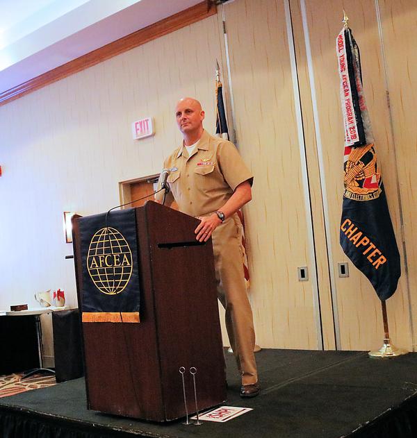 Capt. J.J. "Yank" Cummings, USN, commanding officer, USS GERALD R. FORD (CVN 78), delivers the keynote speech at the July luncheon.