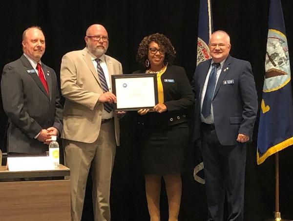 Richanda Bryant, chapter vice president of communications, receives the Chapter AFCEAN of the Month for August.