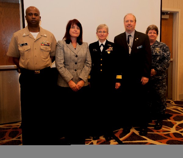 Together at the March luncheon are (l-r) Information Systems Technician 1st Class Corey Walker, USN, Military Cyber Professional of the Month; Tracy Carroll, Civilian Cyber Professional of the Month; Rear Adm. Diane Webber, USN, commander, U.S. Navy Cyber Forces and guest speaker; and Larry Minnick, chapter vice president and AFCEAN of the Month.