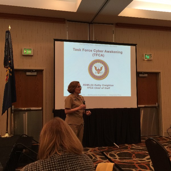 Rear Adm. Kathy Creighton, USN, chief of staff, Task Force Cyber Awakening, addresses a sold-out November chapter luncheon in Norfolk, Virginia.  