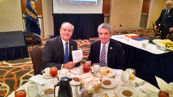 Guest speaker Rep. Scott Rigell of Virginia's 2nd Congressional District (r) sits with Chapter President Palmer Sims at the October luncheon.
