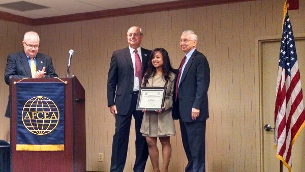 AFCEAN of the month Nhelly Hughes (c) of the Old Dominion University (ODU) Student Chapter, with (from l) Neil Bourassa, Chapter President Palmer Sims and ODU's Dr. Stephen Gordon, receives her award during the September luncheon.