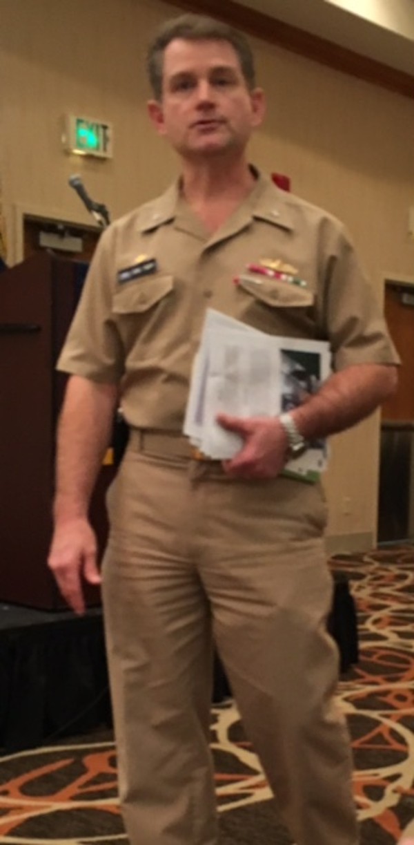 Capt. Eric Tapp, USN, commanding officer, speaks during the January luncheon.