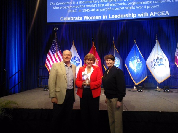 Representing the chapter, Teresa Duvall (c), receives her Women's Appreciation Award during the 2016 AFCEA West Conference in March in San Diego along with Palmer Sims (l) and Vice Adm. Jan Tighe, USN. 