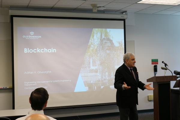 Adrian Gheorghe, a professor of engineering management and systems engineering at Old Dominion University, provides an overview of blockchain technology at the March Lunch and Learn.