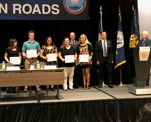 Awardees receive their AFCEA 2019 STEM Scholarship at the August event.