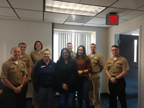 Sailors from the Navy Cyber Defense Operations Command (back row from l-r) Officer 2nd Class Joshua Rogers, USN, Cryptologic Technician Networks; Petty Officer 2nd Class Kyle Ducey, USN, Cryptologic Technician Networks; Cmdr. Steve Sollon, USN, executive director; Lt. Junior Grade Selby Arnold, USN; Petty Officer 2nd Class Dillon Johnson, USN, Cryptologic Technician Networks; and Cmdr. Stephen Mills, USN; visit with members of the Old Dominion Student Chapter (front row from l-r) Skylar Power, Ruhi Patel and Brooke White.