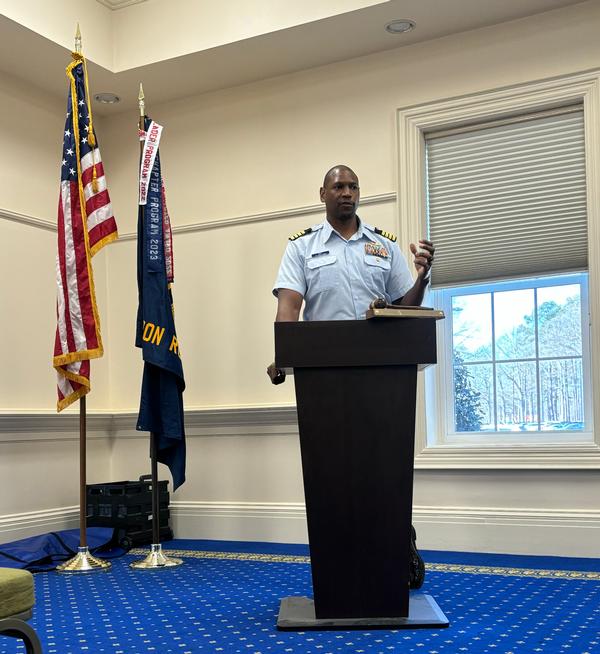 Capt. Benjamin Goff Jr., USCG, Business Operations Division chief of the C5I Service Center in Portsmouth, Virginia, speaks at the chapter's March Luncheon in Virginia Beach, Virginia.