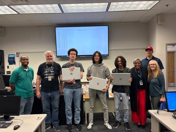 Tidewater Community College students and faculty pose for a photo at the March Coding Competition.