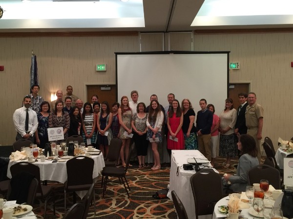 Scholarship award winners receive recognition at the June luncheon.

