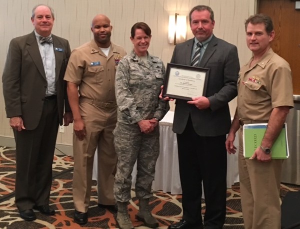 Robert Turner is awarded the Civilian Cyber Professional Award during the January luncheon. Joining him (l-r) Palmer Sims, Lt. Lee Snaer, Col. Jennifer Romero, Joint Staff J7 and Capt. Tapp.